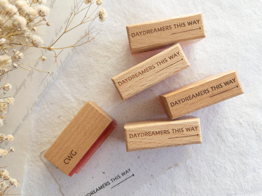 Rubber stamp: Daydreamers this way -->