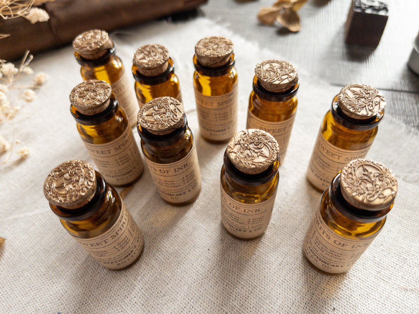Paper clips & studs in vintage-style apothecary bottle