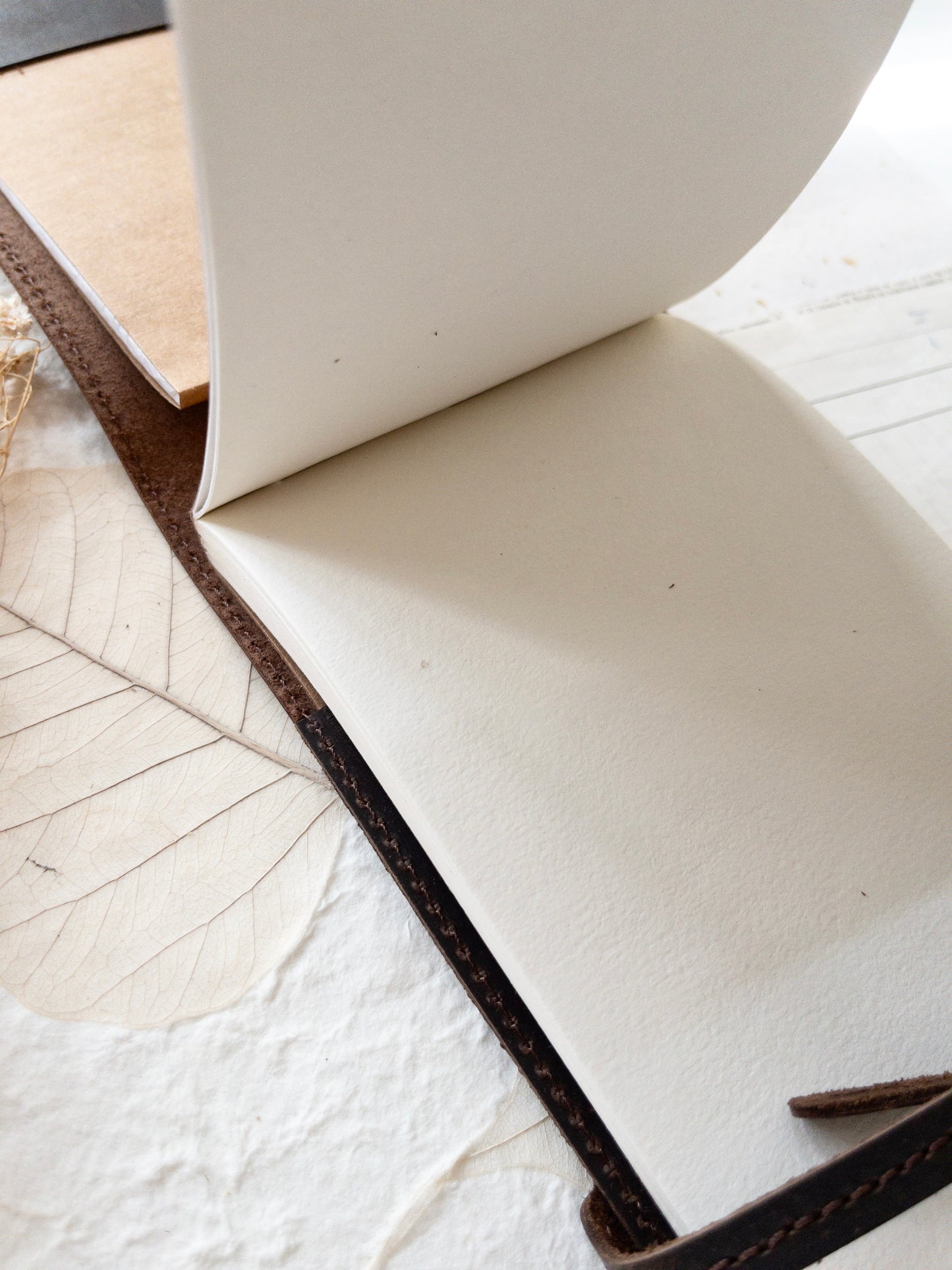 Leather cover with handmade paper insert