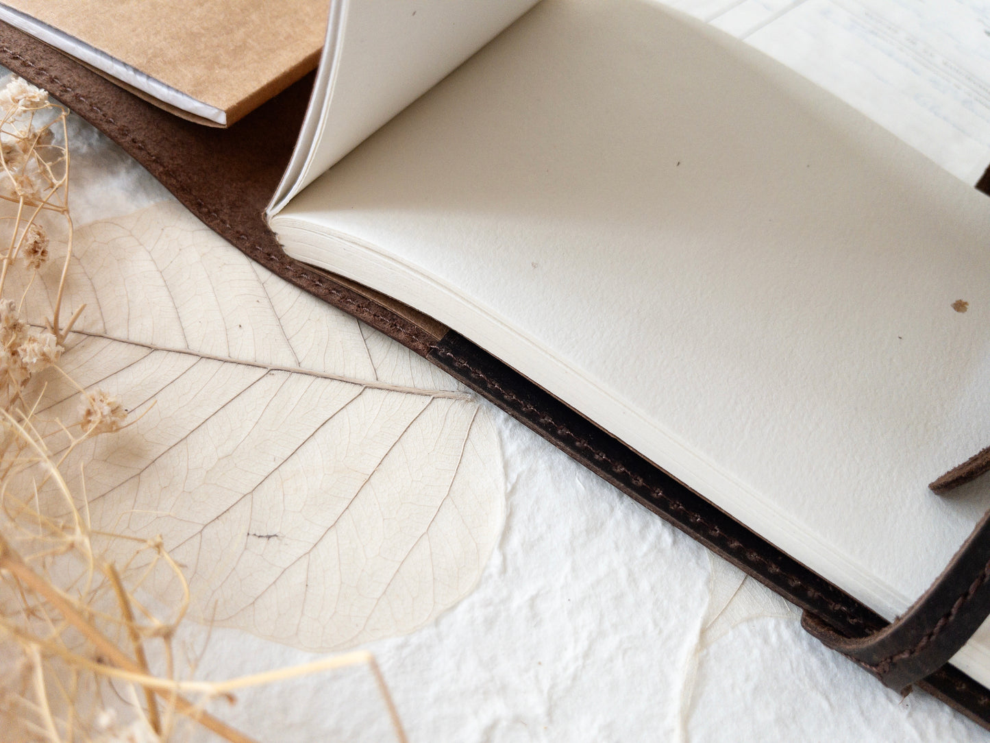 Leather cover with handmade paper insert