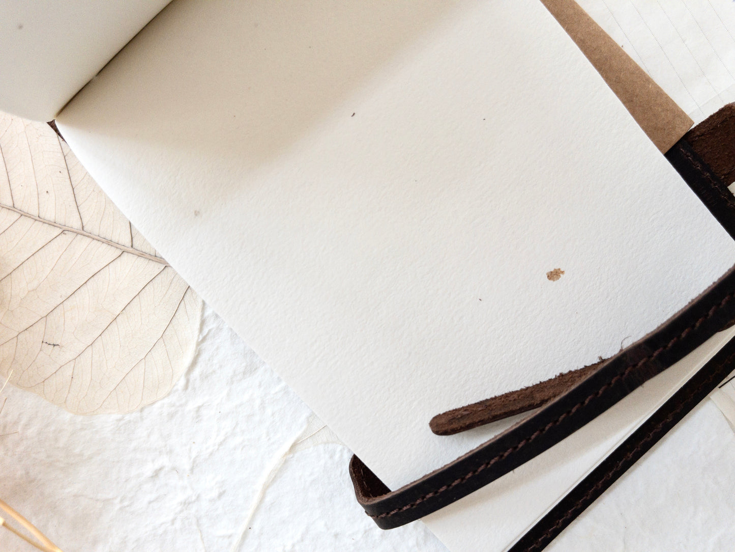 Leather cover with handmade paper insert